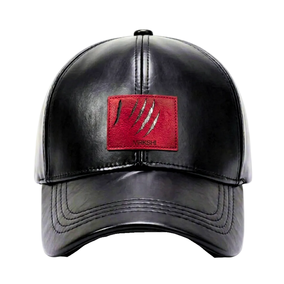 Casquette en cuir premium avec gravure Lion Atlas. Un luxe discret et affirmé.