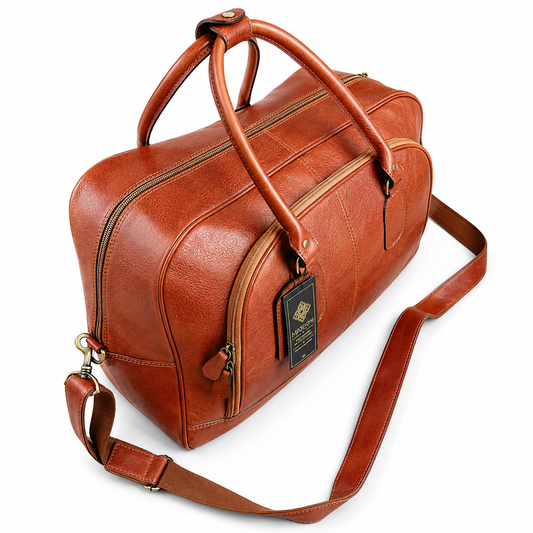 Sac de voyage cuir homme luxe MRKSHI - Sac business class en cuir pleine fleur cognac sans roulettes, style premium pour voyageurs VIP, Sac de voyage en cuir véritable fabriqué au Maroc, travel leather duffel bag premium, luxury weekender bag Casablanca, handmade leather luggage, Sac voyage cuir luxe Maroc, grand sac de voyage en cuir marron, handmade leather travel bag, Casablanca Morocco, Luxury leather travel bag Morocco, sac de voyage cuir véritable, weekender bag premium artisan marocain, Casablanca,